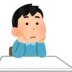 考える人